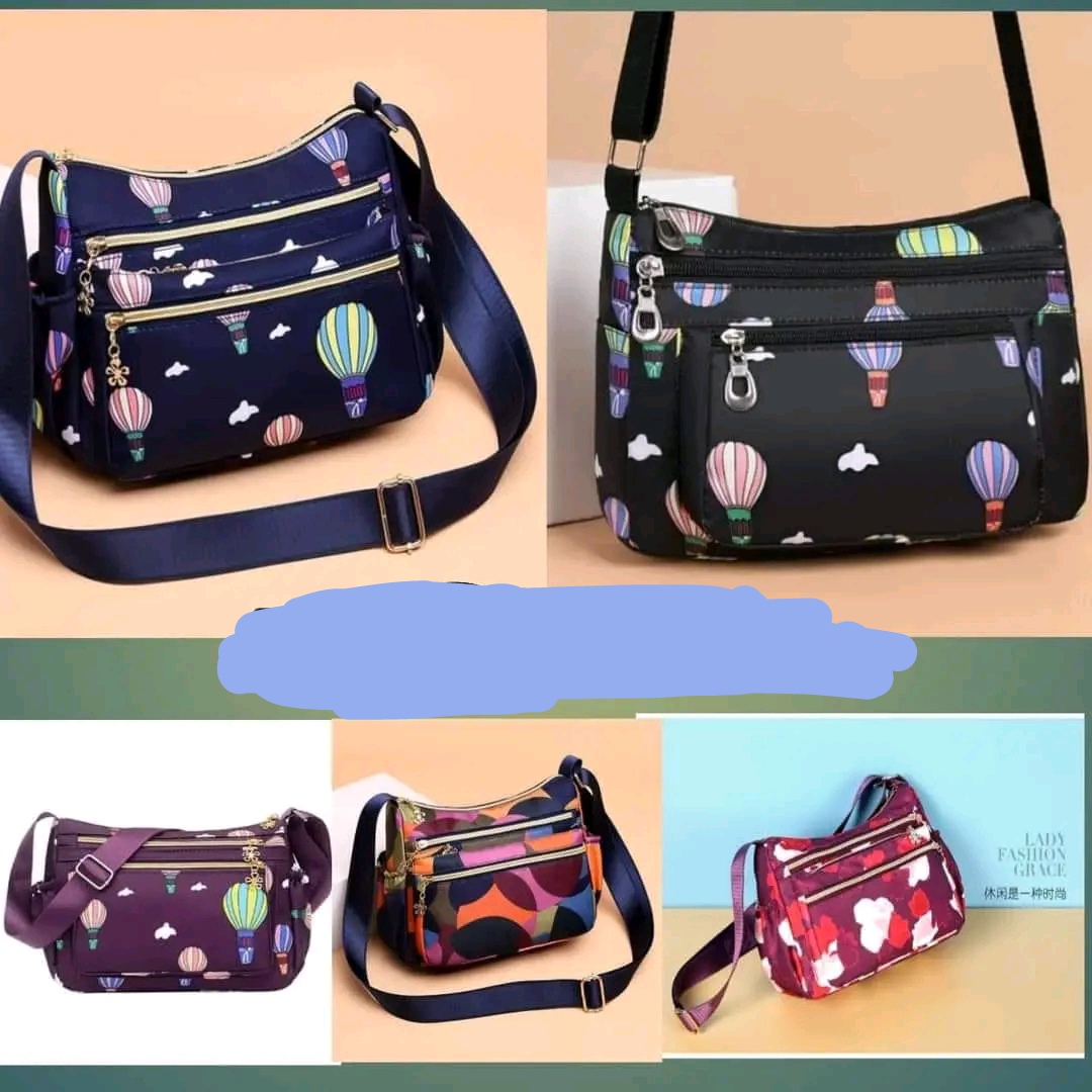 FASHIONABLE LADIES CROSSBODY SOLDER AND HAND BAG.